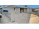 Newly renovated home with a large driveway and updated landscaping at 105 Ash St, Henderson, NV 89015