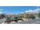 Community view with houses and mountain backdrop at 12064 Avery Meadows Ave, Las Vegas, NV 89138