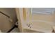 Bathroom with a bathtub and toilet at 12064 Avery Meadows Ave, Las Vegas, NV 89138