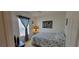Bright bedroom with floral bedding and window coverings at 12064 Avery Meadows Ave, Las Vegas, NV 89138