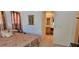 Spacious bedroom with ensuite bathroom and carpet flooring at 12064 Avery Meadows Ave, Las Vegas, NV 89138