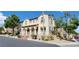 Beautiful two-story house with landscaping and a paved driveway at 12064 Avery Meadows Ave, Las Vegas, NV 89138