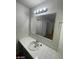 Bathroom with single sink vanity and mirror at 1590 Mustang Dr, Henderson, NV 89002
