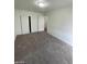 Simple bedroom with carpet and double closets at 1590 Mustang Dr, Henderson, NV 89002