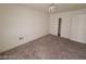 Spacious bedroom with carpeted floor and mirrored closet at 1590 Mustang Dr, Henderson, NV 89002