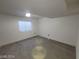 Bright bedroom with wood-look floors and a window at 1590 Mustang Dr, Henderson, NV 89002