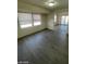 Dining area with hardwood floors and access to other rooms at 1590 Mustang Dr, Henderson, NV 89002