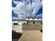 House with three-car garage and wooden fence at 1590 Mustang Dr, Henderson, NV 89002
