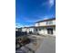 Two-story house with front porch and walkway at 1590 Mustang Dr, Henderson, NV 89002