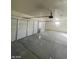 This three-car garage provides ample space for vehicles and storage at 1590 Mustang Dr, Henderson, NV 89002