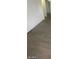 Long hallway with hardwood floors at 1590 Mustang Dr, Henderson, NV 89002