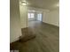 Open living area with hardwood floors and access to backyard at 1590 Mustang Dr, Henderson, NV 89002