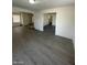 Hardwood floors and an open floor plan in this living room at 1590 Mustang Dr, Henderson, NV 89002