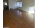 Living room boasting hardwood floors and natural light at 1590 Mustang Dr, Henderson, NV 89002