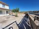 Landscaped yard with wooden fence at 1590 Mustang Dr, Henderson, NV 89002
