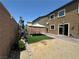 Spacious backyard featuring patio, gravel area, and artificial turf with a gazebo for outdoor relaxation at 181 Elexese Ct, Las Vegas, NV 89183