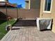 Paver patio and artificial turf create an inviting outdoor living space at 181 Elexese Ct, Las Vegas, NV 89183