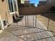 Paver patio with dog run in backyard at 181 Elexese Ct, Las Vegas, NV 89183