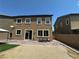 The backyard features brick pavers and seating at 181 Elexese Ct, Las Vegas, NV 89183