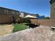 The backyard has artificial grass, gravel, and brick pavers at 181 Elexese Ct, Las Vegas, NV 89183