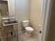 Powder room bathroom features commercial sink, and tiled floor at 181 Elexese Ct, Las Vegas, NV 89183