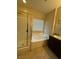Bathroom featuring a shower, soaking tub, and vanity at 181 Elexese Ct, Las Vegas, NV 89183