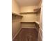 Walk-in closet with wall to wall shelving and racks, providing ample storage space at 181 Elexese Ct, Las Vegas, NV 89183