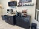 Coffee bar features a wine cooler and storage, perfect for entertaining guests at 181 Elexese Ct, Las Vegas, NV 89183