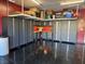 Garage with custom installed cabinets and overhead storage at 181 Elexese Ct, Las Vegas, NV 89183