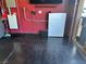 Garage featuring a Tesla power wall, providing backup energy solutions at 181 Elexese Ct, Las Vegas, NV 89183