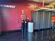 Garage setup with shelving, cabinets, and a water system for convenience at 181 Elexese Ct, Las Vegas, NV 89183