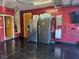Garage with two refrigerators and a Tesla power wall at 181 Elexese Ct, Las Vegas, NV 89183