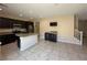 Kitchen with stainless appliances, granite counters, and tile flooring at 181 Elexese Ct, Las Vegas, NV 89183