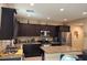 The spacious kitchen features granite countertops and modern stainless steel appliances at 181 Elexese Ct, Las Vegas, NV 89183