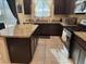Modern kitchen features granite countertops, stainless steel appliances, and ample cabinet space at 181 Elexese Ct, Las Vegas, NV 89183