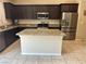 Modern kitchen with stainless steel appliances and granite countertops at 181 Elexese Ct, Las Vegas, NV 89183