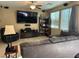 Comfortable living room featuring a ceiling fan, and a sectional sofa set at 181 Elexese Ct, Las Vegas, NV 89183