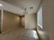Spacious living room featuring tile flooring and ample natural light at 181 Elexese Ct, Las Vegas, NV 89183