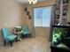 Inviting seating area with a large aquarium, showcasing modern interior design and relaxing atmosphere at 181 Elexese Ct, Las Vegas, NV 89183