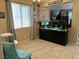 Inviting living space with a large fish tank and natural light, perfect for relaxation and entertaining at 181 Elexese Ct, Las Vegas, NV 89183
