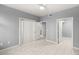 Bedroom with tile floors and access to bathroom and closet at 2251 Wigwam Pkwy # 211, Henderson, NV 89074