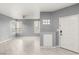 Spacious living room with tile floors and ceiling fan at 2251 Wigwam Pkwy # 211, Henderson, NV 89074
