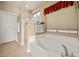 Bathroom with large bathtub and separate shower at 2520 Links Dr, Laughlin, NV 89029