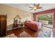 Spacious bedroom with hardwood floors and access to a private patio at 2520 Links Dr, Laughlin, NV 89029