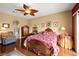 Elegant bedroom with hardwood floors and ensuite bathroom access at 2520 Links Dr, Laughlin, NV 89029