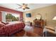 Bright bedroom featuring hardwood floors and a large window at 2520 Links Dr, Laughlin, NV 89029