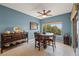 Bright dining area with a round table and access to a patio at 2520 Links Dr, Laughlin, NV 89029