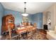 Elegant dining room with a period-style table and hutch at 2520 Links Dr, Laughlin, NV 89029