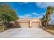 Two-story house with a two-car garage and driveway at 2520 Links Dr, Laughlin, NV 89029