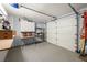 Garage with storage cabinets and workbench at 2520 Links Dr, Laughlin, NV 89029